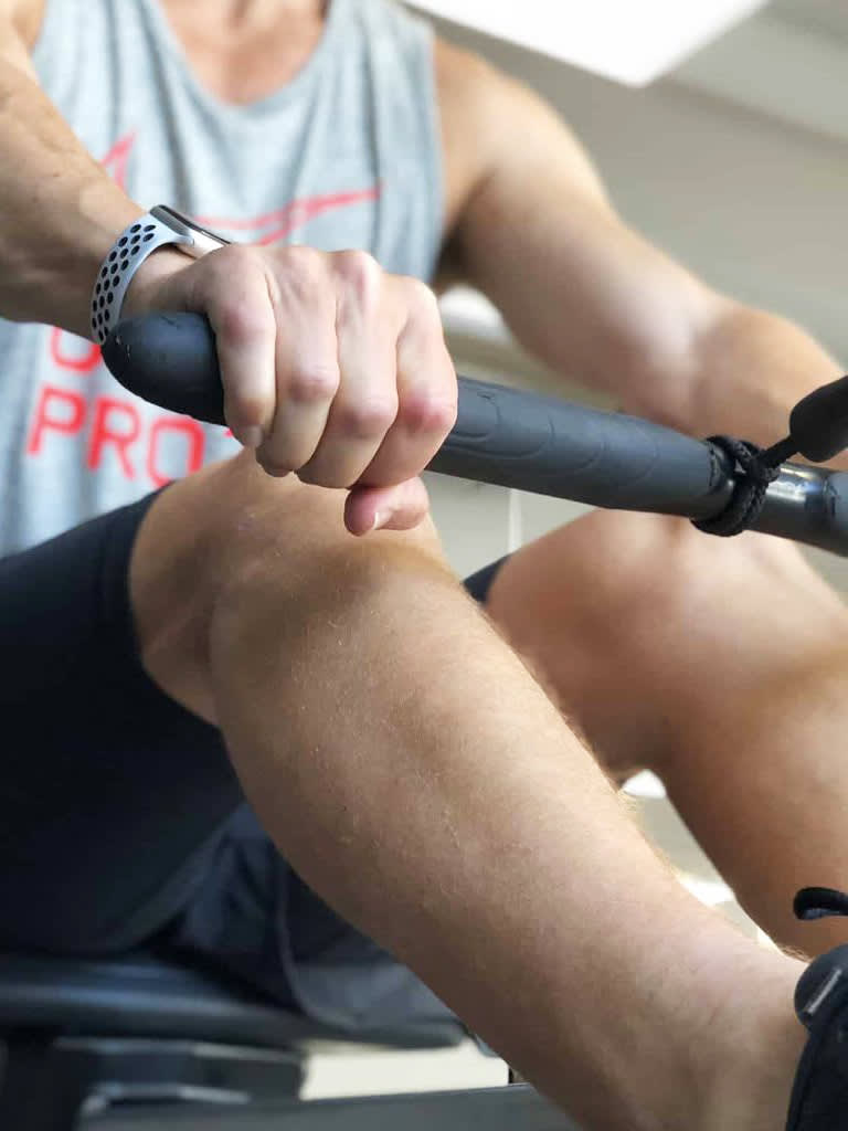 Athlete using Concept2 Model D indoor rower